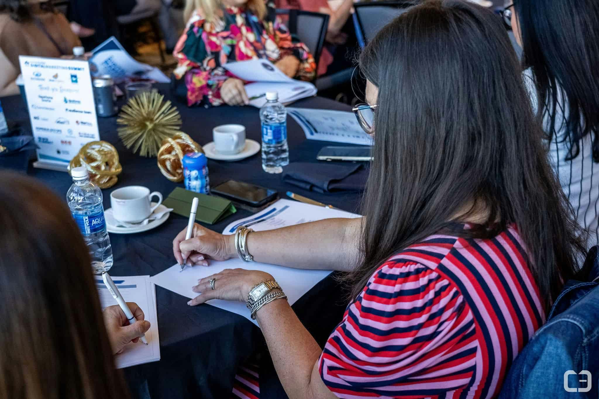 Home Builder Digital Marketing Summit attendee taking notes