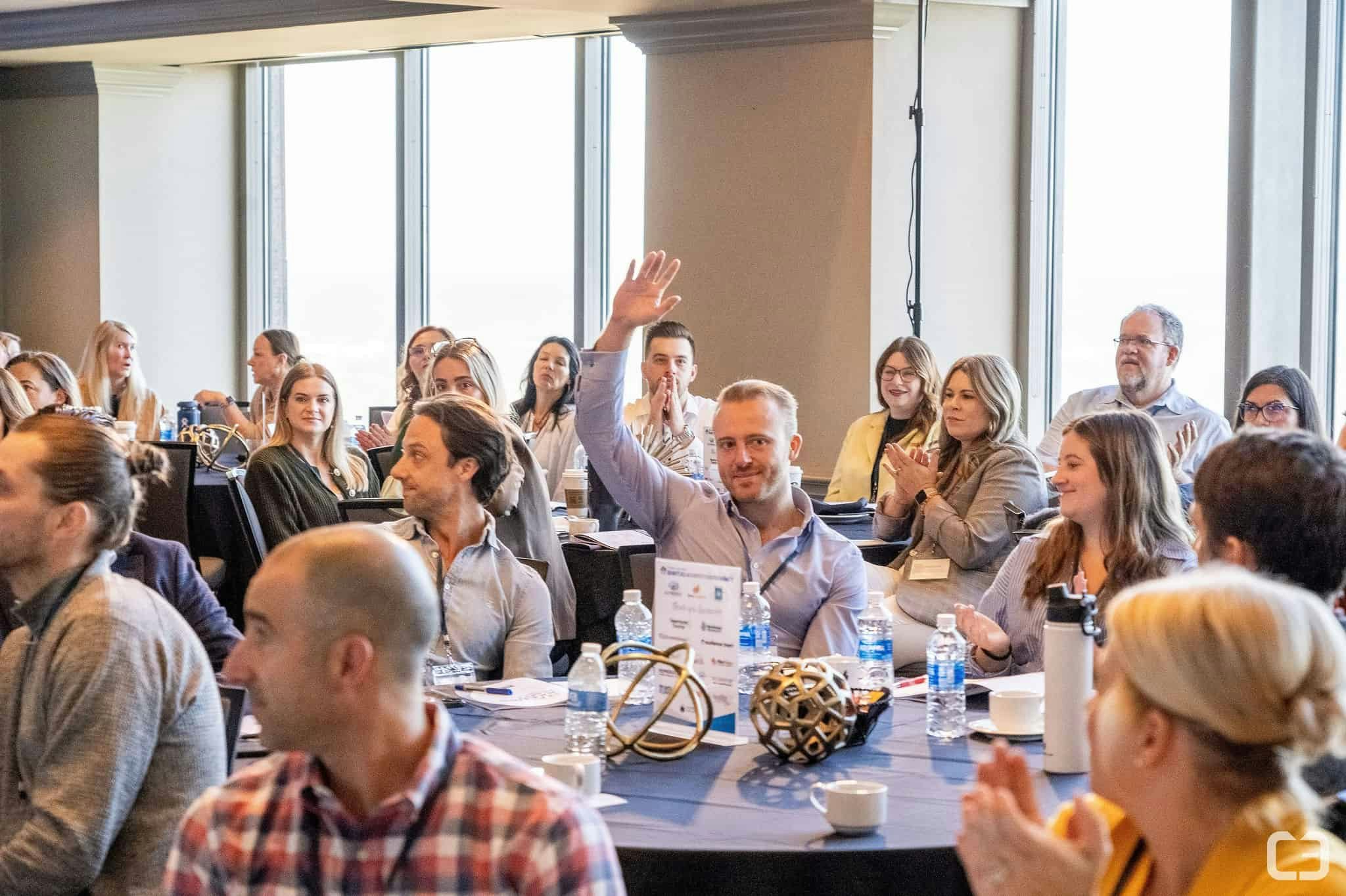 Home Builder Digital Marketing Summit attendees waving